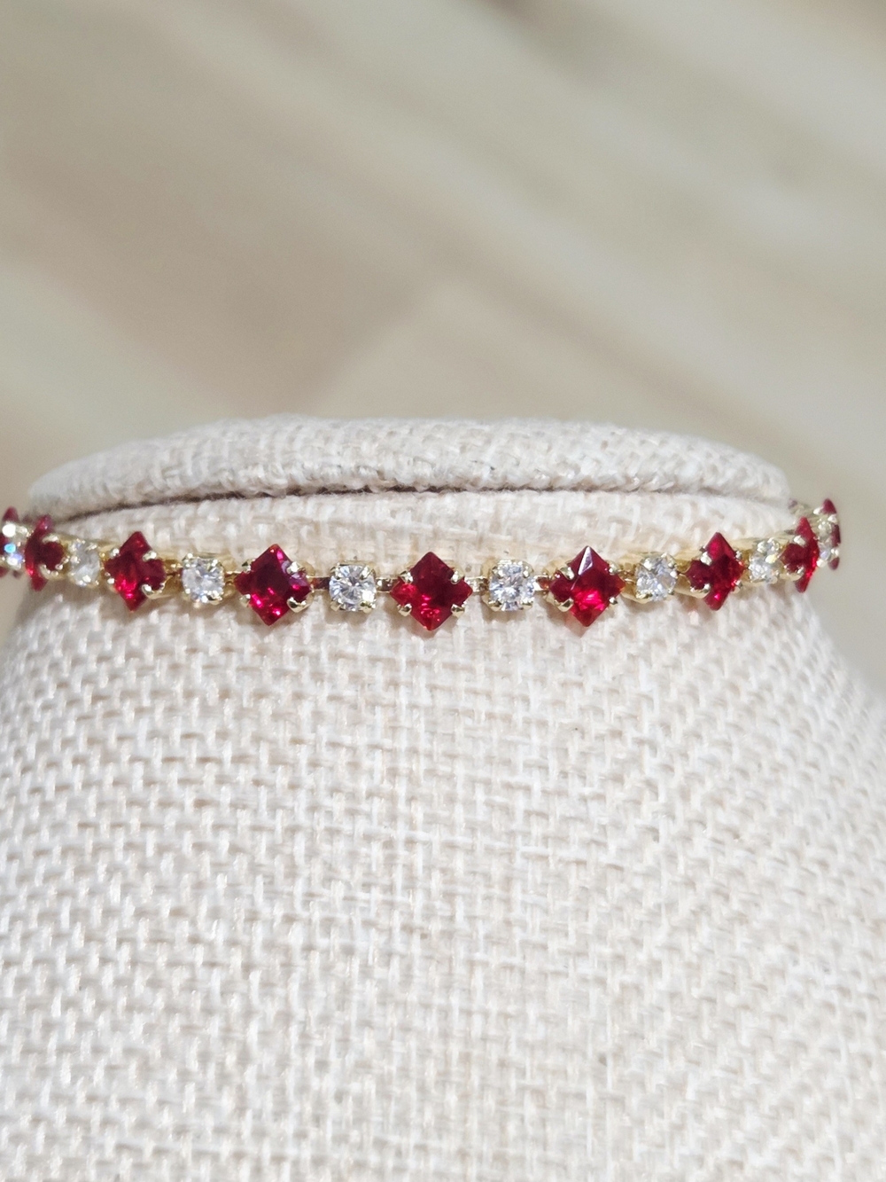 Gold-filled Bracelet with Red Gemstones and Clear Accents